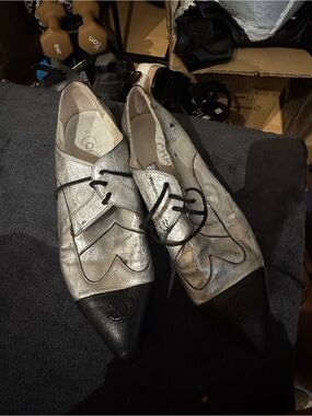 CHANEL Silver Leather Pointed Lace-Up Flats with Black Toe Caps